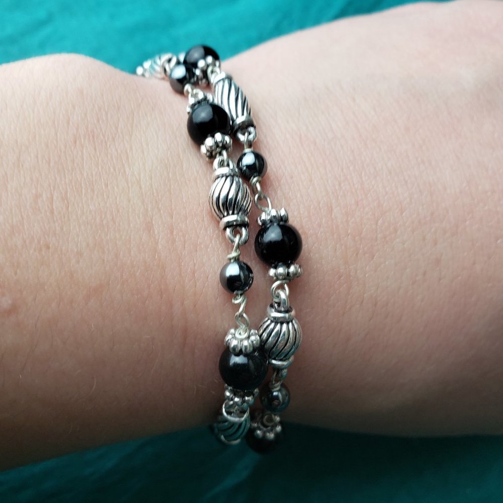 2/15$ Napier black and silver tone bracelet